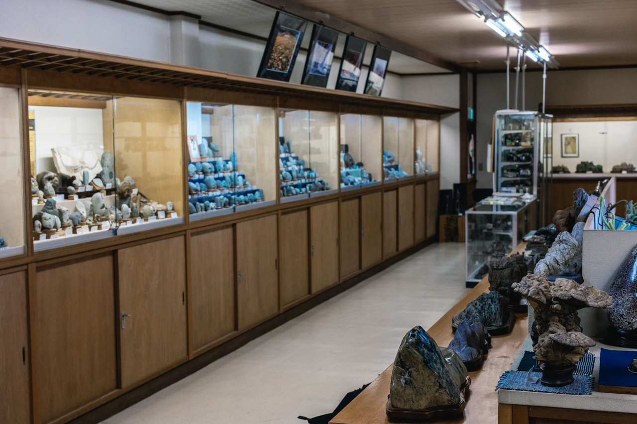 Display cabinets filled with stones inside Chinsekikan.