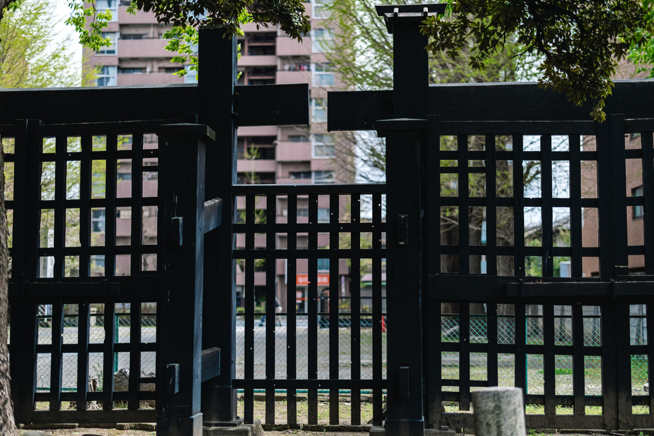 Historic black Kuro-mon gate in the grounds of Entsuji Temple, originally from Kaneiji in Ueno.