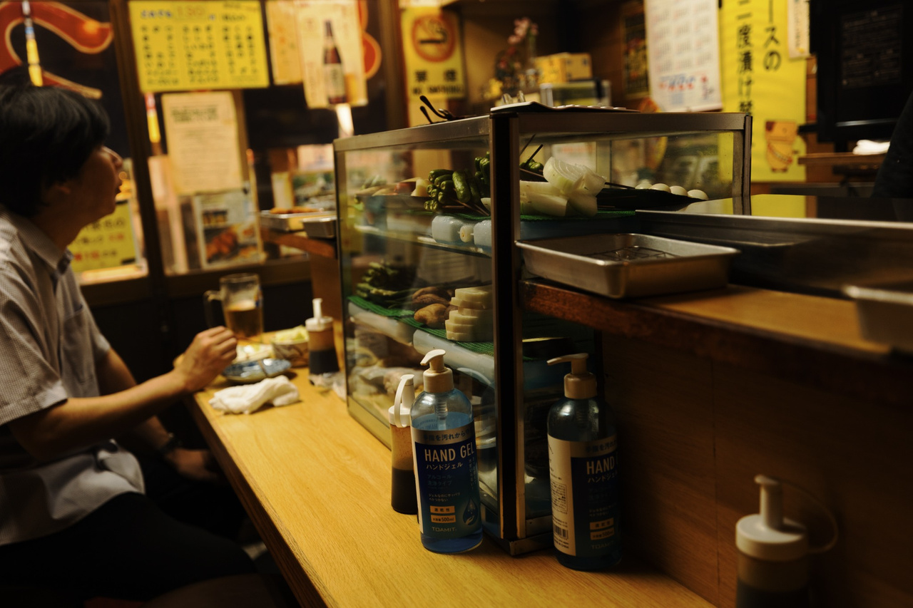 The small counter and glass ingredient case inside Kikuya in Shinsekai, Osaka.