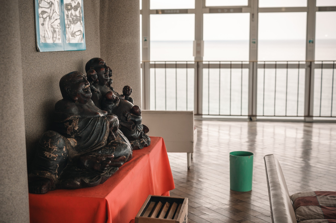 Figure of Hotei displayed on the observation deck of Tojinbo Tower.