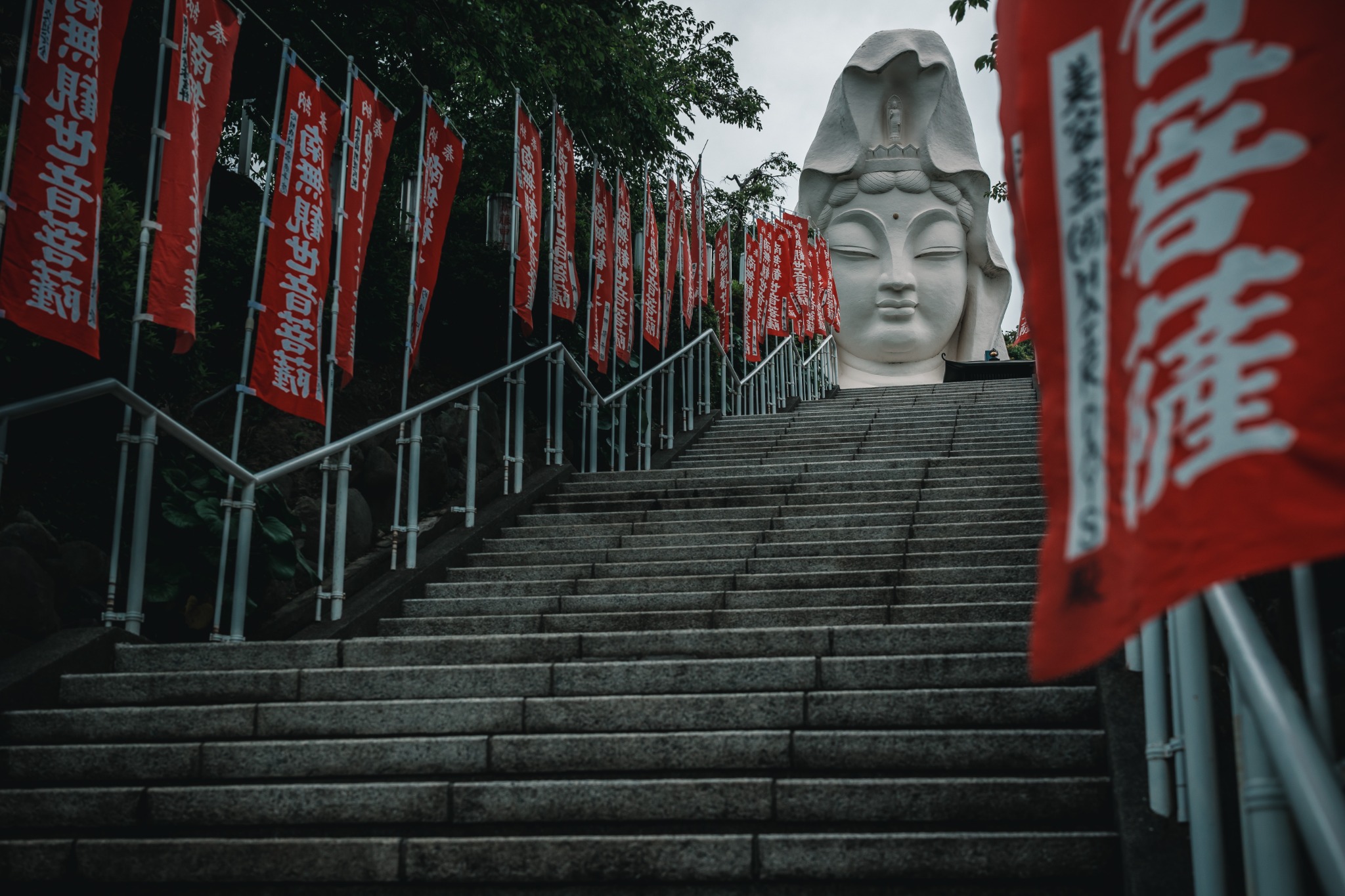 Ofuna Kannon rising above the approach steps at Ofuna Kannonji Temple in Kamakura.