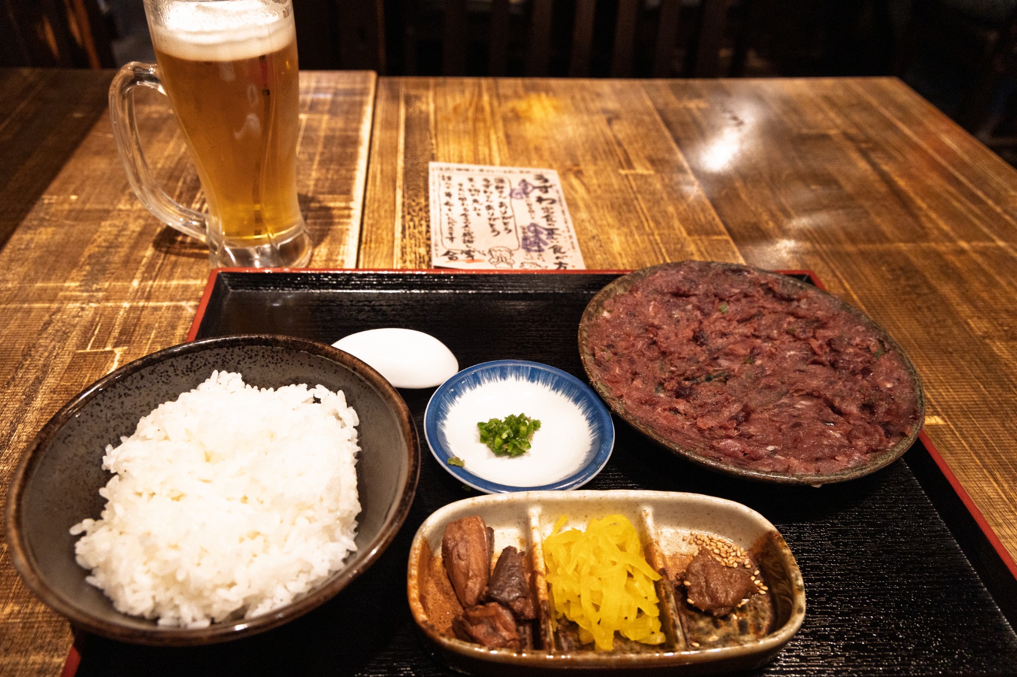 Uzuwa set meal at Rakumiya Marugen in Ito, with finely chopped dark-red fish served beside rice, green chilli and side dishes.