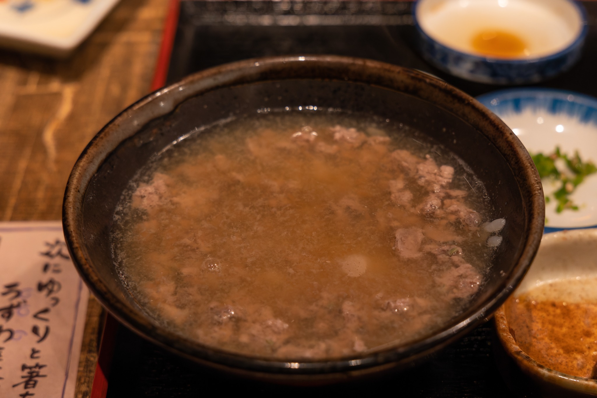 Uzuwa ochazuke with chopped fish and rice in hot broth.
